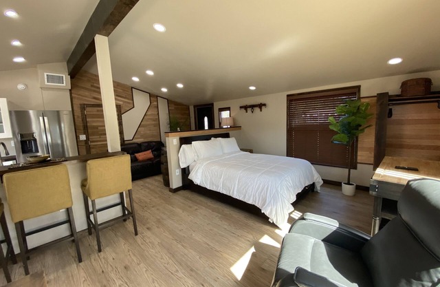 Modern Ranch Studio With a Beautiful Round Porch