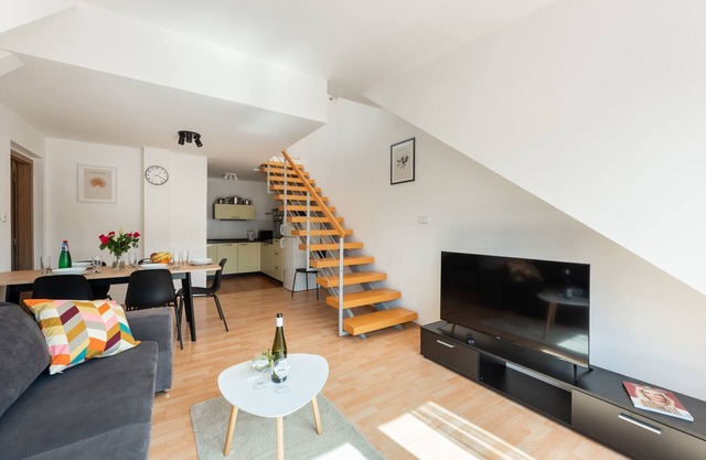 Modern two-level apartment with balcony