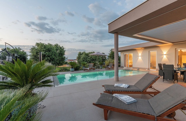 Modern villa Serena with pool,beautiful garden,quiet location,panoramic sea view