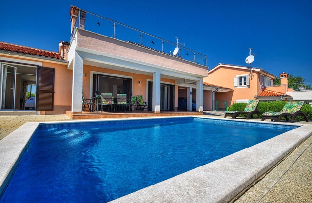 Modern villas with pool and great sea views, best amenities.
