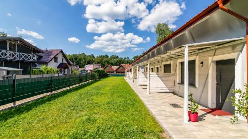 Morskie Domki Apartamentowe by PIAMOLA