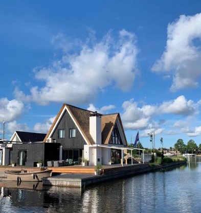 New high end waterfront family villa