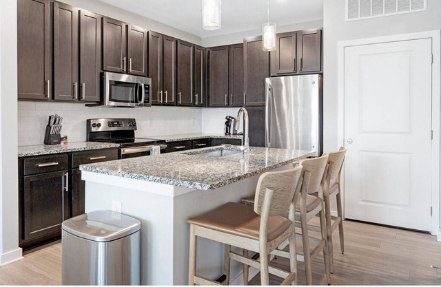 NEW LISTING! Contemporary large 1BR, in unit Washer/Dryer, parking with all amenities! by RedAwning