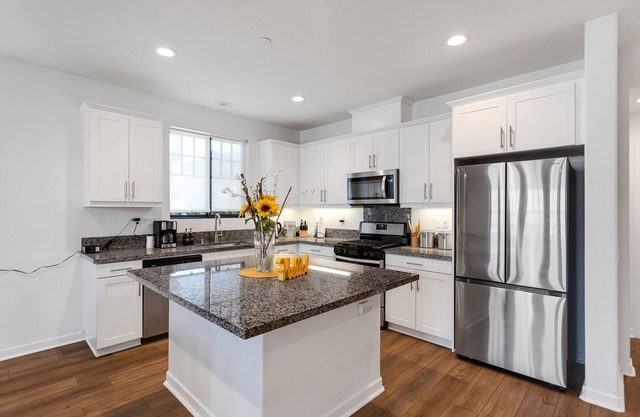 NEW LISTING! Townhouse Retreat with Outdoor Bliss by RedAwning