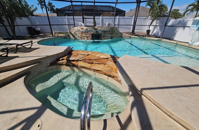 NEW! Serene House with Spectacular Heated Pool/Spa, FREE Bikes, Amenities, Beach