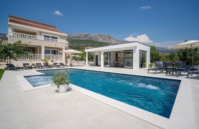 NEW! Villa Marisa with 51sqm heated, private pool, 5 bedrooms, 4 bathrooms, summer kitchen, views of the Adriatic sea and town Split