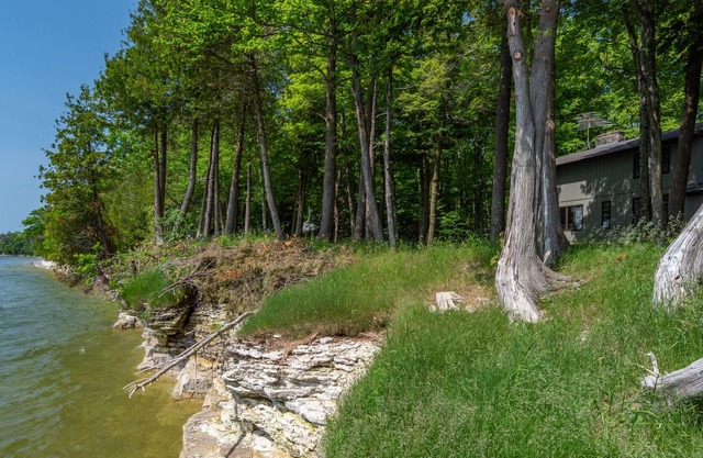 Newly remodeled 3 bedroom home on 200 feet of Lake Michigan shoreline!