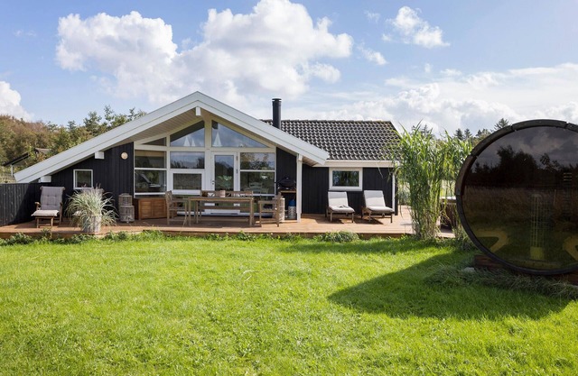 Nice home in øster assels with sauna