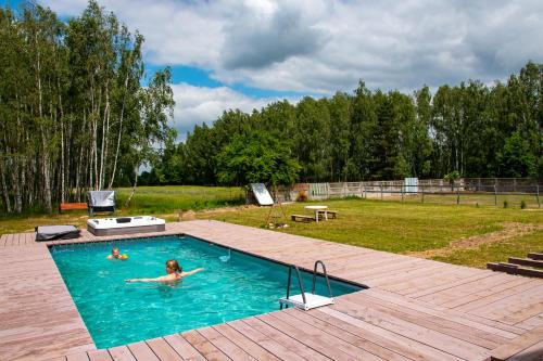 Nowa Wola 58 - 200qm appartment in a small village, with pool, sauna and big garden