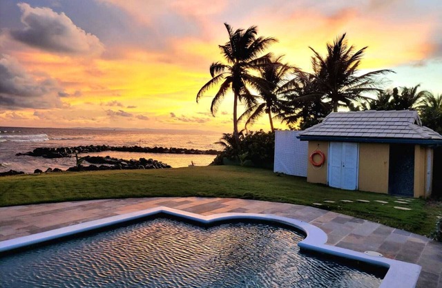 Ocean front luxury villa in gated golf course community with private beach.