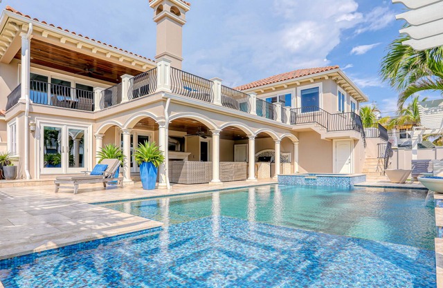 Oceanfront home with pool, hot tub, pool table, washer/dryer, fireplace & AC