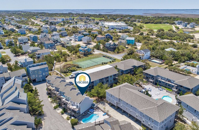 Oceanside condo with pool, tennis, 2 balconies, central AC, & washer/dryer