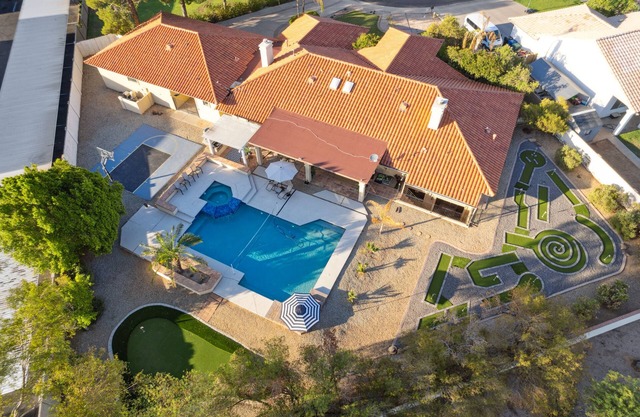 One-of-a-Kind Home w Mini Golf + Pool & Spa Tub