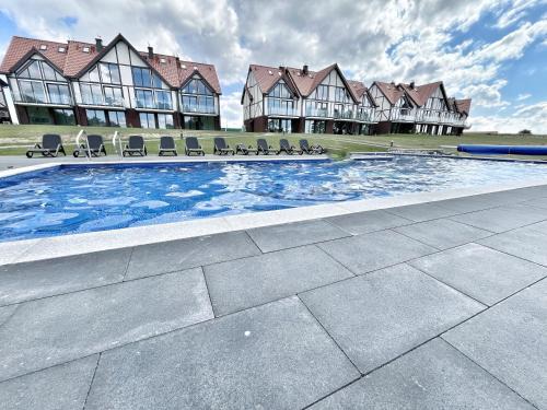 Orli Dziób - apartament nad brzegiem z basenem i sauną