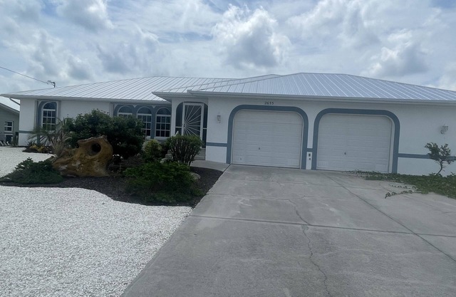 Paradise Found: 3/2 Home with Pool, Canal Access, and Pet-Friendly Amenities