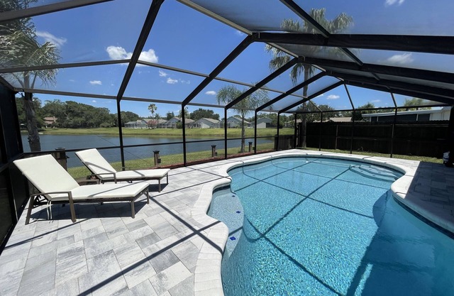 Peaceful Poolside Lake Home 15 Mins to Tampa