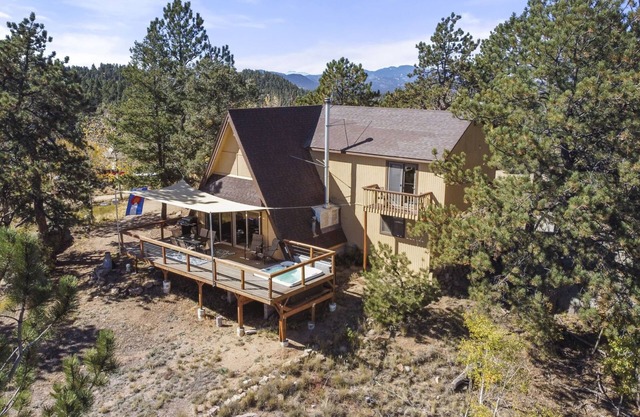 Pikes Peak A-Frame Retreat w/Hot Tub & stunning mountain views. Pets welcome!
