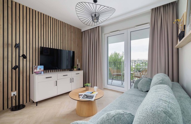Prandoty 10C Cozy Apartment with Balcony & Parking in Krakow by Noclegi Renters