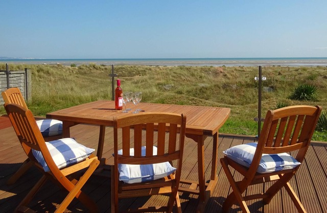 Premier spacious house. Sleeps 10. Direct Access to beach. Superb sea views.