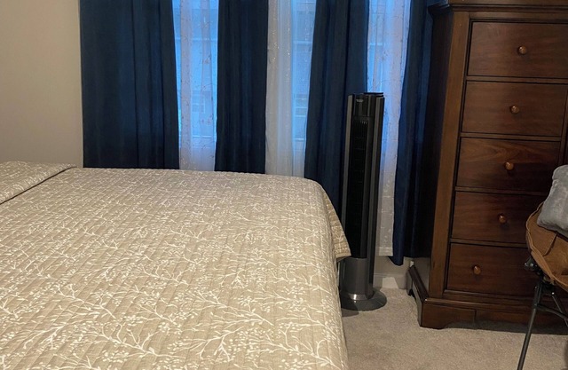 Primary bedroom and private bathroom space. Shared kitchen and dining area