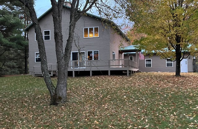 Private 27 acres with trails, out buildings a library full of books