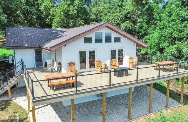 Private, modern home with river view, on 48 acres