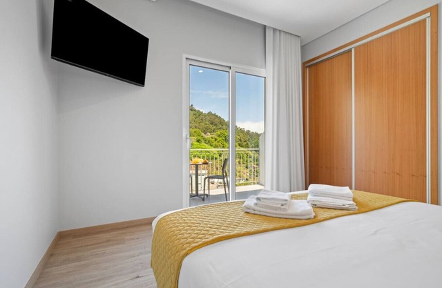 Quarto Duplo Deluxe com Varanda Q3