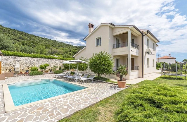 Quiet and beautiful house with amazing sea view and outside kitchen by the pool