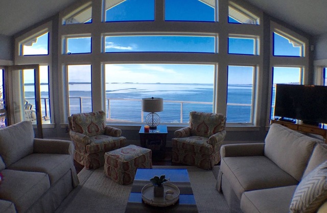 Rare July 12th week available! Panoramic views from this updated oceanfront home