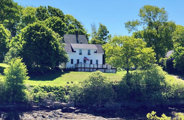 Recently renovated 3 bedroom, 2 bathroom home with elevated views into Lowell`s Cove