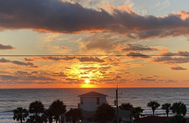 Remodeled 3 BR/2BA condo steps to the beach! Sunset views and private garage.