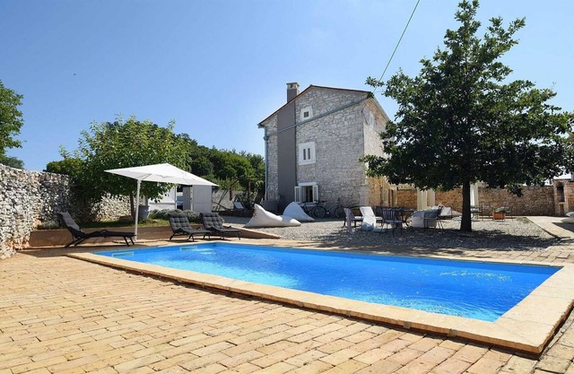 Renovated charming stone villa with swimming pool in Režanci