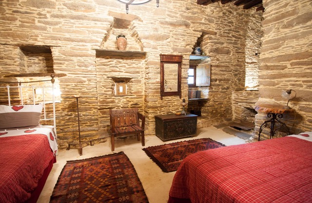 Renovated medieval cottage 200 sqm at Andros, accommodates up to 8 guests.