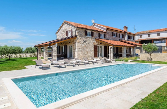 Renovated stone house in a quiet location ? ideal for two families.