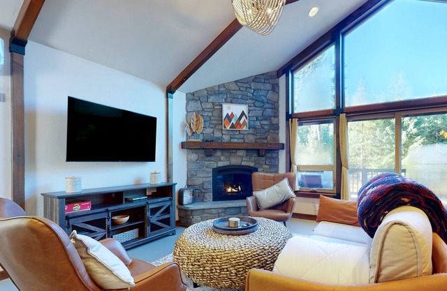 Restful rustic with scenic outdoor area, fireplace, & washer/dryer