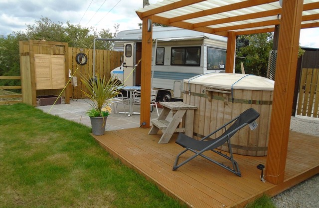 retro 70,s bedford camper with own hot tub , sauna and pool by reservation