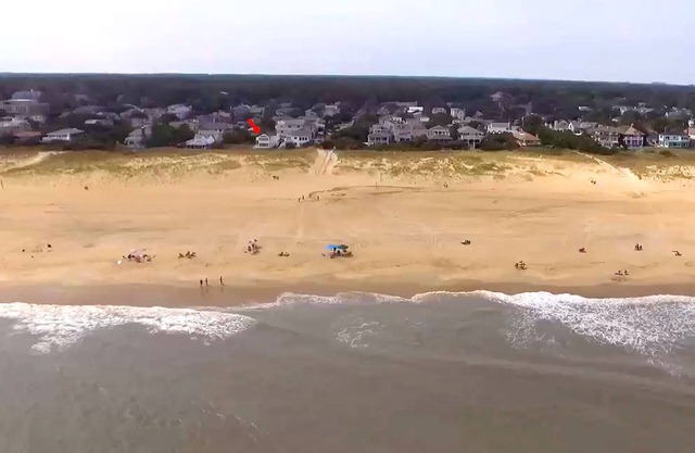 Right on the Beach with no streets to cross: a North End Hidden Gem Family Home!