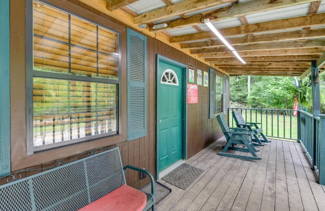 Riverfront Briceville Cabin with Patio and Fire Pit!