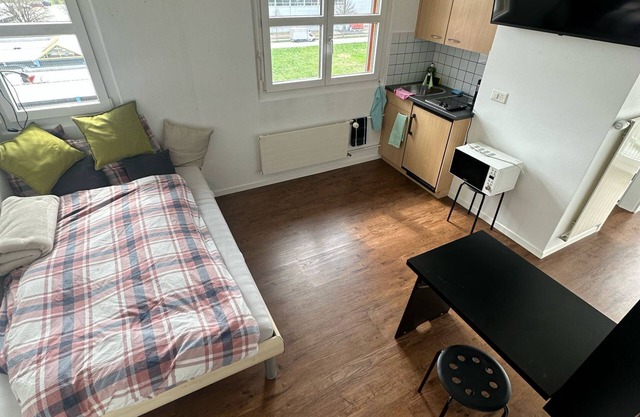 Room with bathroom and balcony