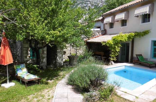 Rustic stone house with pool