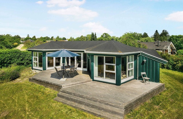 Scenic summer house near quiet lapping waves