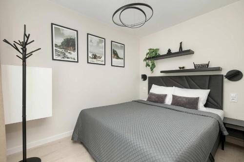 Seaside Apartment with Parking and Air Conditioning Close to the Beach by Noclegi Renters