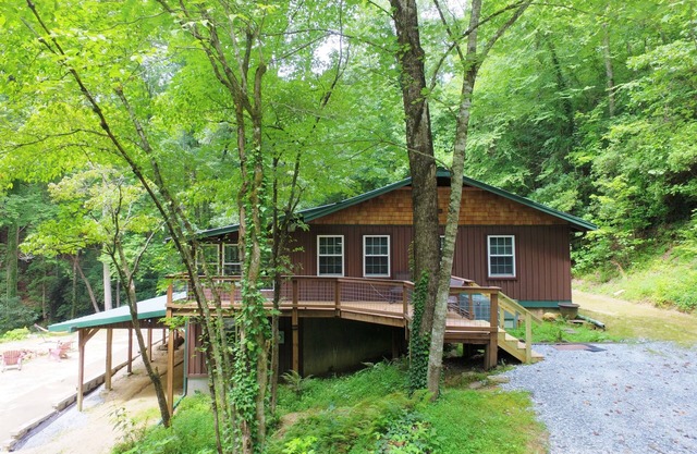Secluded cabin surrounded by mountains, waterfalls, wildlife, and 50,000 acres