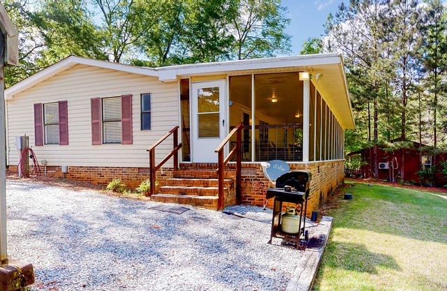 Secluded, waterfront home w/ a large yard, private dock, & water access!