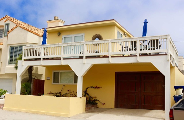 See and hear the ocean from this beautiful beach house steps from the beach.