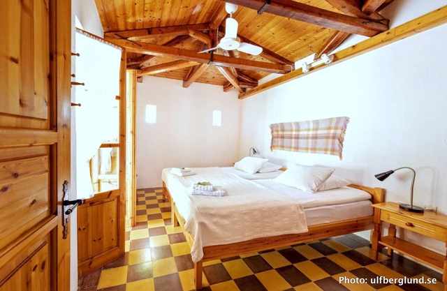 Self catered cottage with large veranda and garden with hammock near the beach.