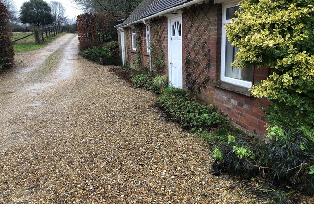 Single floor, self-catering Annexe next to main house, with parking.