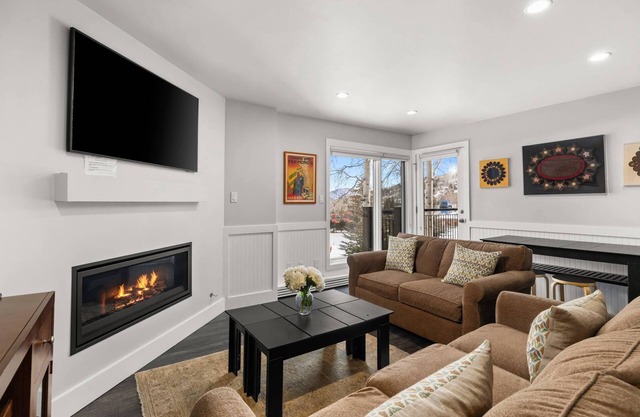 Ski-In/Ski-Out Escape, Unwind by the Fire, Soak in Hot Tubs, & Enjoy a Heated Pool Steps from Slopes