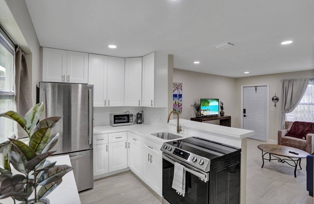 Sleeps 4! Renovated, fenced private yard/patio. Pet Friendly.