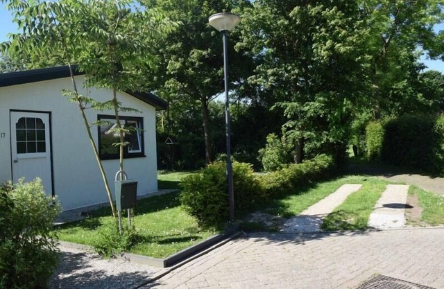 Small house with garden, directly behind the dyke